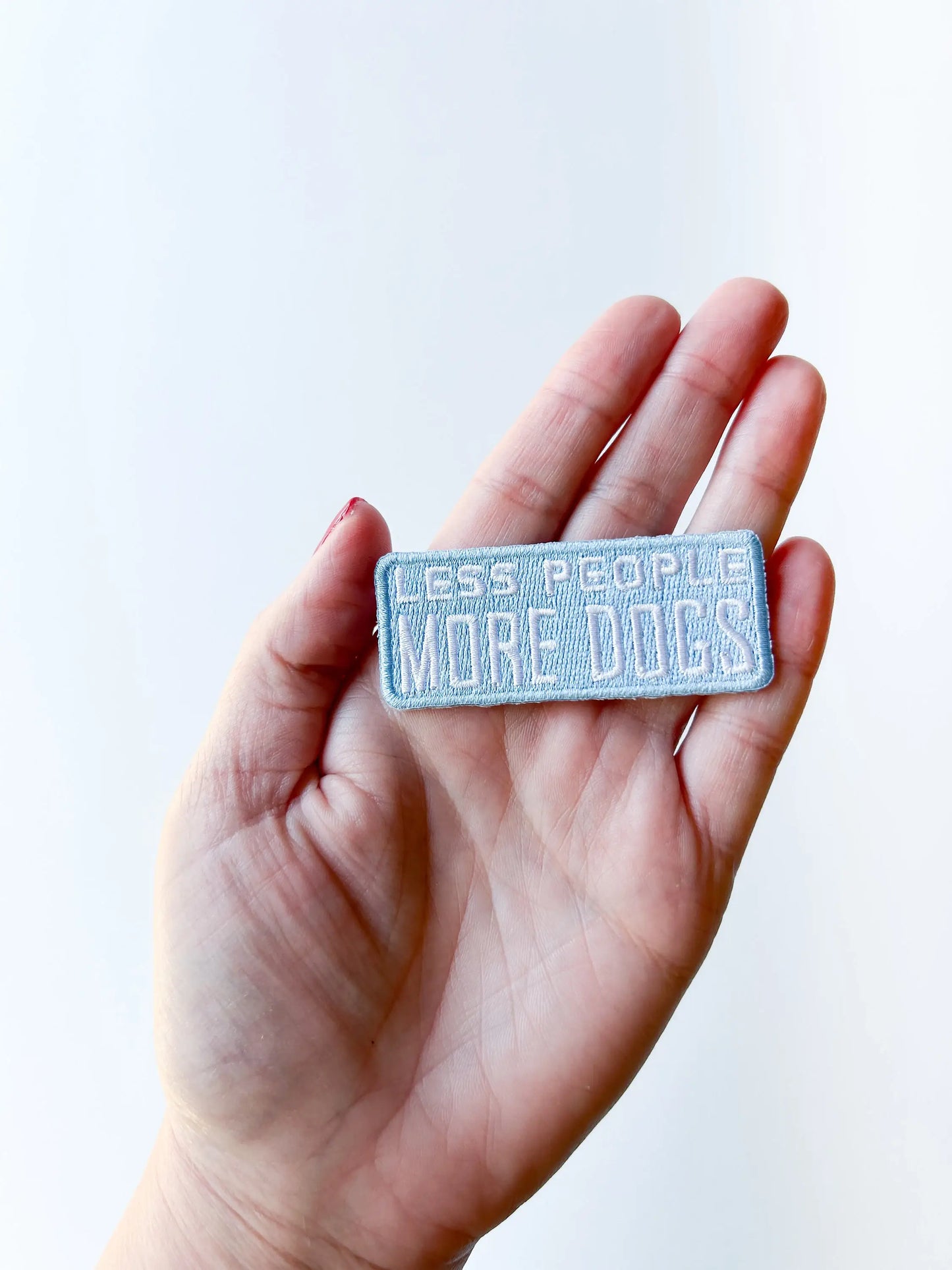 Less People More Dogs Light Blue Embroidered Iron On Patch