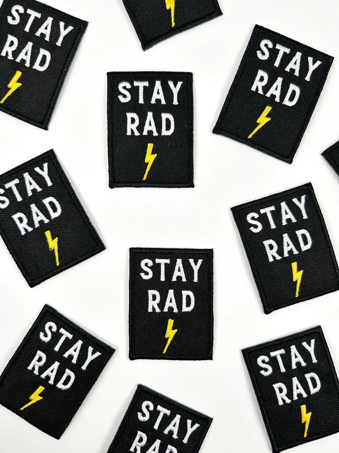 Stay Rad Embroidered Iron-On Patch with Lightning Bolt Black